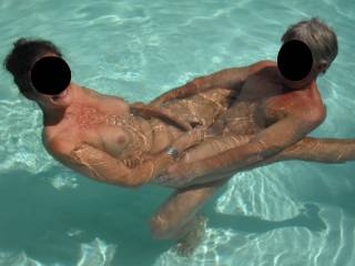 Fun in our swimming pool at home with our swinger friend, when he came around for a threesome.