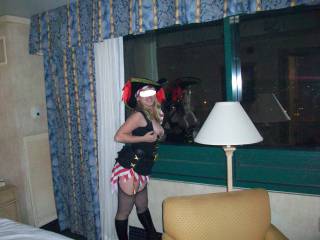 flashing my tits out the hotel window halloween night in hollywood before we went down to the parade. I was so horny by the time we went down there that my pussy was dripping down my leg. So many strangers saw my pussy that night.