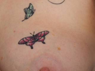 Delicate ink on a wonderful tit.
My Sussex Submissive shows off her butterfly's which include my initial..