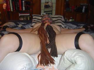 I had her tied up getting ready to whip that pussy, She love it! Preping her for a good fuck pounding! Any female want to play?