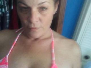You can see her nice tits thru her little bikini top