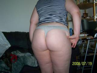 Lupo\'s wife showing off some panties she had bought to wear for me.  Whoelse loves that round ass of hers?