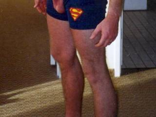 my proud member standing at attention poking out of my boxer briefs.  Do you think Superman would be proud of this cock and balls with the Superman logo?