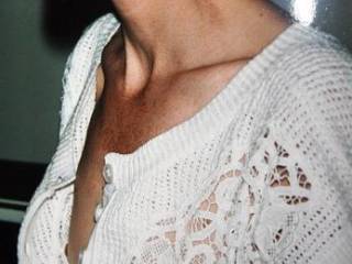 Very Seductive and OooHhh Sooooooooo Sexy!!  Can't blame us for bending our necks to get a better look at those fantastic nipples peek a booing through that lace!!  You are so a tease!  Love it!  I would love to sneak up and take a lick right through the lacy peek a boo hole teasing your nipple so it protrudes all the way out, run my tongue around it enticing you and hubby to meet me later for hours of hot erotic fun!!