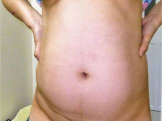..Hoa (Ouk).showing of her swollen pregnant belly , swollen milk laden tit's...do you like what you see?????.