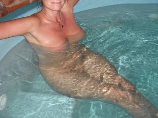 Relaxing in our spa at home after giving my Hubby a lovely long blowjob.  Big smile on my face, as I have the taste of my Hubbies cum still in my mouth after he shot a big load.