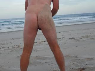 Picture of nude backside at the beach.