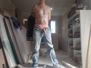 paul working in denim pants on his house building site
