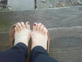 I love this ladies feet, nicely painted nails, and toe ring.