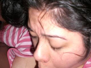 My latina friend sucking my cock deep and hard. She is deep in concentration and making sure I am enjoying it.