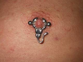 a view of my new left tit piercing