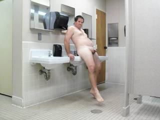 naked in a public  bathroom