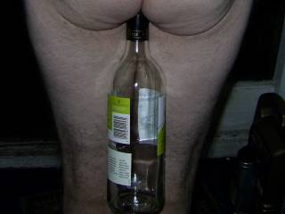 Just look at that little tight ass and how it grips the bottle...hmmm