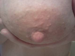 Do you like my perky nipple?  Would you like to see more?  What would you like to do with them?
