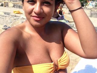me sunbathing in my yellow bikini