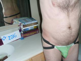 I have a stack of books in the bathroom to read...All are non- fiction & various subjects. A frontal scene of my bottomless undie. You can barely see my butt crack in the mirror.