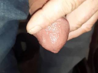 Playing with my cock and pre - cum.