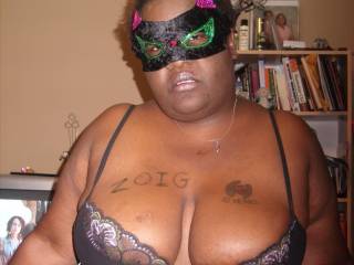 This is a picture of my beautiful wife and her beautiful tits. See Zoig on the right breast? She is wearing a mask because she is really shy.