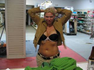 she listened to his commands. ups driver wanted to see her in bra and her suede jacket. she was getting excited stripping for him