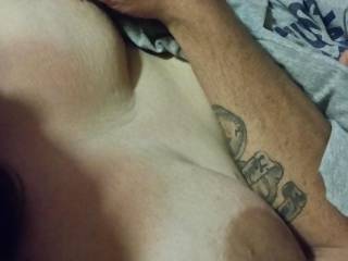 I was playing with my wife's tits while watching a movie and she had no idea that I was taking pictures
