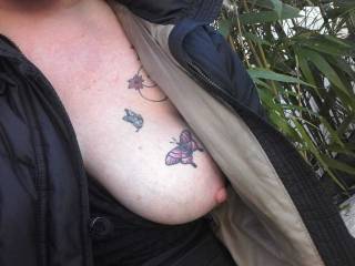 There is just NO stopping Sally showing of her tattoos in public! It just so happens that also involves getting her tits out too!