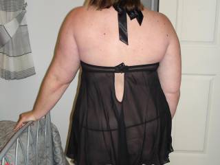 Anita from behind in her new swingers outfit