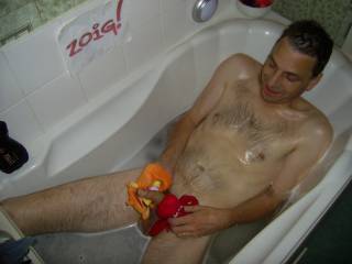 oooh looks like hubby likes to play with toys in the bath too - seems tigger and lobster are getting a closer look at that cock of his - anyone else want a closer look at that cock?