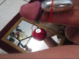 Cumming with my vibrator as the cum drips on an ornament hanging from my cock. Make sure to turn up your volume for the funny soundtrack.