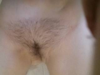 Wow I would love to lay my cock deep in that pretty beautiful hairy pussy of yours balls deep