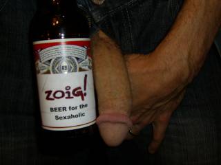hmmmm this is how I like my beer served - in a nice bottle with nibbles on the side...what about you?
