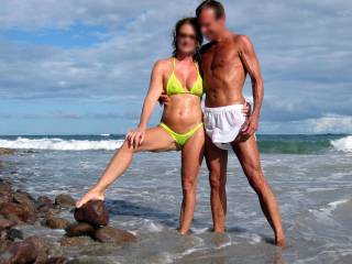 Great photo of such a hot couple enjoying each others beauty and the natural scenery of the surf in the back ground is incredibly erotic!  Everyone viewing will be clearly liking the mesmerizing view!