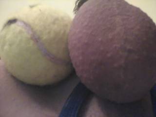 My balls vs tennis ball. This is my tied up balls after 41 days without cumming. Is it small or big? Who girl wanna lick od squeeze them? I will waiting for it.