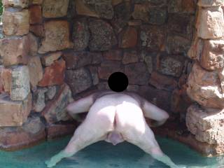 Hubby in our pool, just like I like to keep him...NUDE!  Any ladies wanna fuck my hubby in his ass?  I would love to see him get ass fucked...hehehe!!!