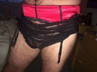 in wifes red suspender, black frilly panties and stockings. Feels so sexy