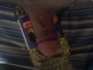 Semi hard dick in oil bottle