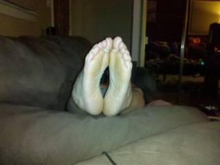 her sexy feet waiting for my cock to slide between them