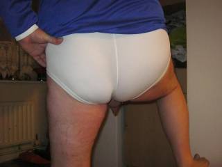 Early morning pose of my tight shorts-accentuated buttocks for all you ass fetishists!!!!