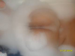 the wifey taking a bubble bath. great view