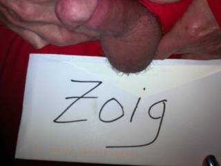 here is my wife holding the official Zoig sign under my balls