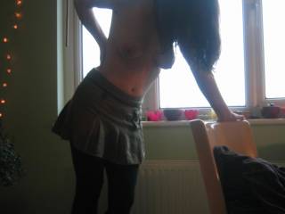 I wouldn't mind bending you over the window sill and then lifting that little skirt up.