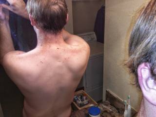 Cleaning up the back of my hair. Thought my backside looked pretty good :)