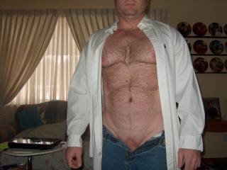 I love a man with his chest exposed so I can play with his hairy chest and in jeans with his cock begging to be free