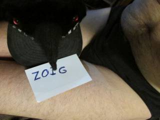 Loon hat on my lap,with a slight bulge in my undie`s...which has a wet spot