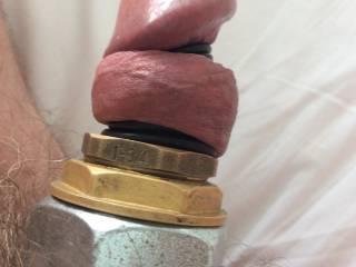 Cyborg cock wearing rubber and metal rings
