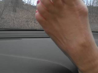 GREAT view....I couldn't be behind the wheel though. It's an rtc waiting to happen as I couldn't take my eyes off those breath takingly hot sexy toes I quite literally ache to have between my lips to suck, lick and taste....Beautiful!!