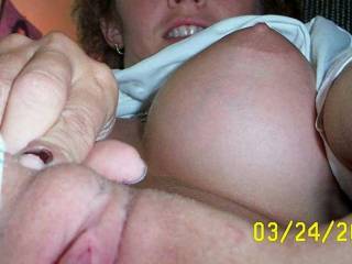 Mmmmm...what a delicious spread...I would love to have that sweet pussy...taste it, fuck it....and those amazing tits are driving me wild too honey!!