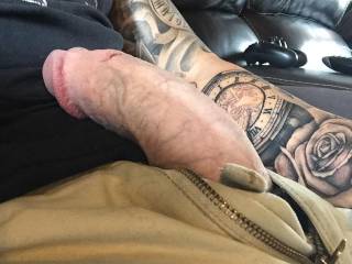 Sitting and relaxing on couch with cock out