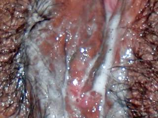 A close-up of my wife's sexy cum covered pussy!  I love vacation sex!!!