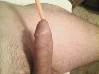 His dick with a favorite silicone sound half way in, he likes to have them hanging out.