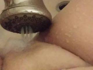 The wife loves fucking herself with the shower massage